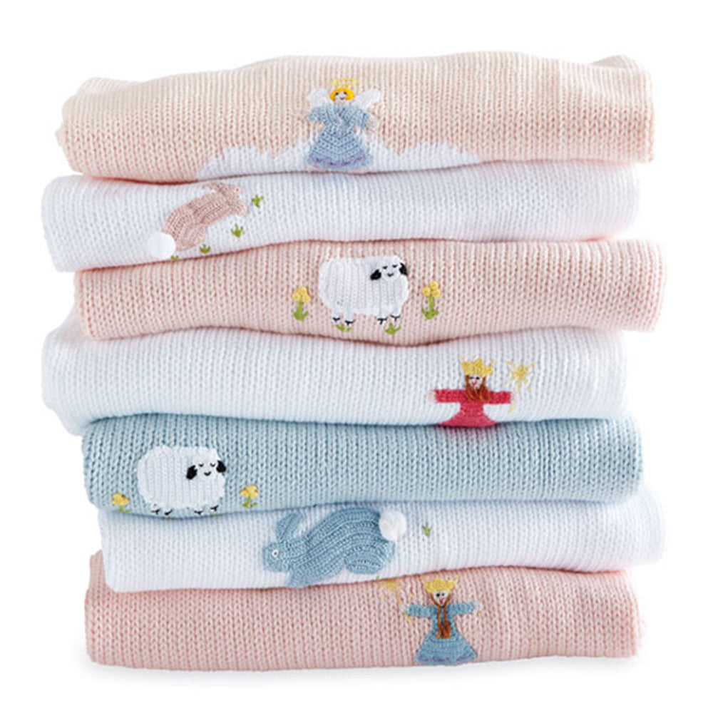 white, blue, and pink applique baby blankets