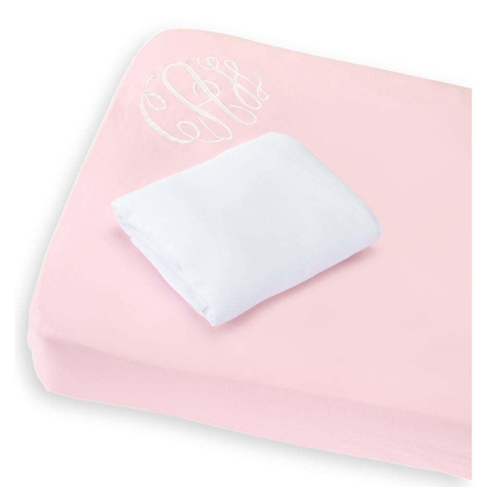 White with pink solid pima crib sheet set