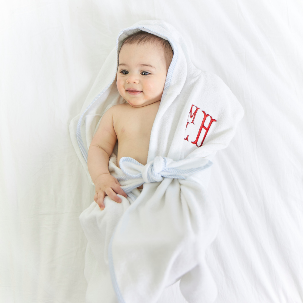 Baby boy wrapped in blue bliss hooded terry bath sac